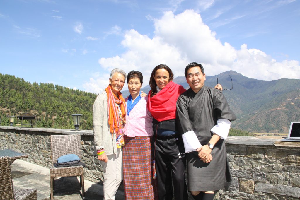 bhutan-tour-guide-with-clients